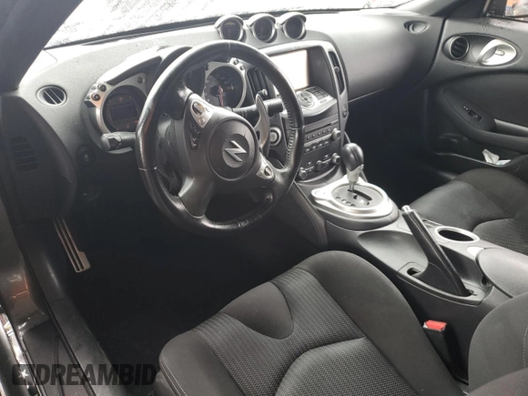 2016 Nissan 370Z Sport с VIN JN1AZ4EH3GM936250, выставлен на аукционе Copart как лот 44227205 с пробегом Не указан миль и Списание • Salvage title. История ставок и продаж доступна на DreamBid. Изображение 8.