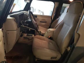 2005 Jeep Wrangler Sport with VIN 1J4FA49S35P341517, listed as a Copart auction lot 65224645 with 153,832 mi miles and Clean title. Bid and sale history available at DreamBid. Image 7.