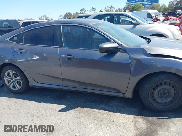 2017 Honda Civic LX with VIN 2HGFC2F56HH525914, listed as a IAAI auction lot 42190331 with 139,464 mi miles and . Bid and sale history available at DreamBid. Image 13.