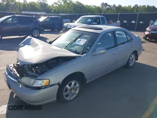 1999 Nissan Altima XE with VIN 1N4DL01D4XC252973, listed as a IAAI auction lot 42005504 with 247,570 mi miles. Bid and sale history available at carsss.com. Image 2.