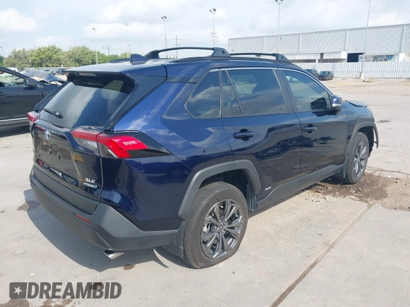 2024 Toyota RAV4 Hybrid XLE Premium with VIN 4T3B6RFV6RU146619, listed as a IAAI auction lot 42060476 with 22,594 mi miles and . Bid and sale history available at DreamBid. Image 4.
