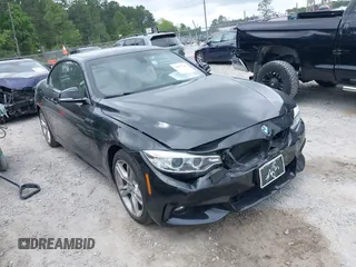 2015 BMW 4 Series 428i xDrive with VIN WBA3T1C55FP820539, listed as a IAAI auction lot 42073267 with 64,744 mi miles and . Bid and sale history available at DreamBid. Image 1.