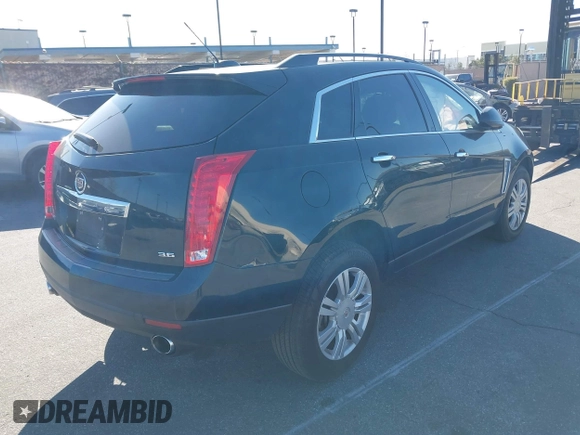 2015 Cadillac SRX z VIN 3GYFNAE32FS543933, wystawiony jako IAAI lot #41578338 z przebiegiem 150 937 mil mil oraz . Historia ofert i sprzedaży dostępna na DreamBid. Obrazek 4.