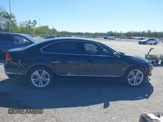 2012 Volkswagen Passat SE z VIN 1VWBN7A3XCC086400, wystawiony jako IAAI lot #41839332 z przebiegiem 83 567 mil mil oraz . Historia ofert i sprzedaży dostępna na DreamBid. Obrazek 13.