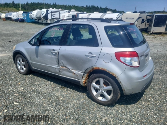 2009 Suzuki SX4 Man AWD with VIN JS2YB413196204559, listed as a Copart auction lot 61994234 with 180,757 mi miles and Salvage Title. Bid and sale history available at carsss.com. Image 2.