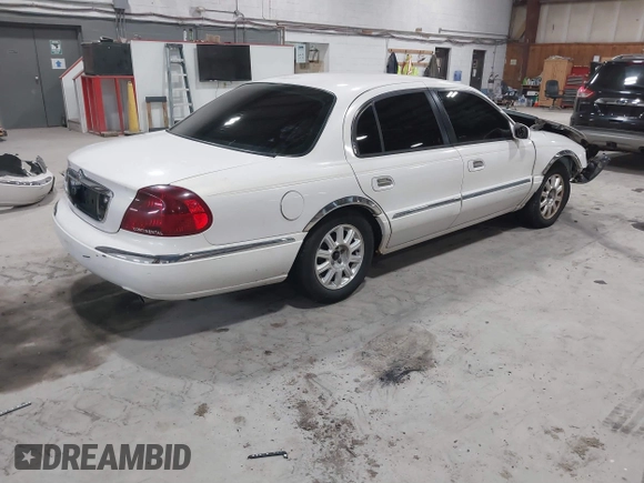 2001 Lincoln Continental with VIN 1LNHM97V81Y667328, listed as a IAAI auction lot 41730916 with 126,179 mi miles and . Bid and sale history available at DreamBid. Image 4.