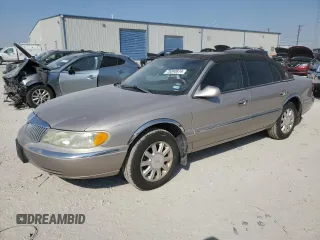 2002 Lincoln Continental with VIN 1LNHM97V32Y647800, listed as a Copart auction lot 75240874 with 71,689 mi miles and Salvage Title. Bid and sale history available at carsss.com. Image 1.
