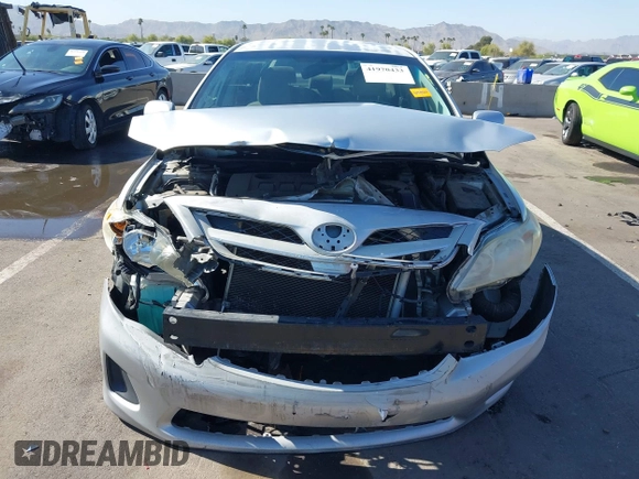 2011 Toyota Corolla L with VIN JTDBU4EE0B9151332, listed as a IAAI auction lot 41970433 with 113,157 mi miles. Bid and sale history available at carsss.com. Image 12.