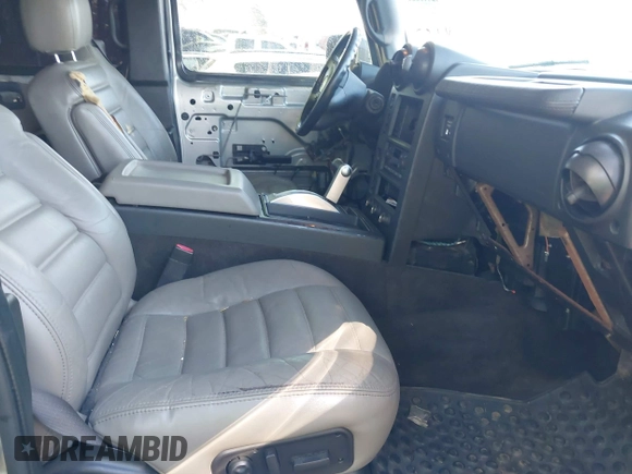 2005 Hummer H2 SUT with VIN 5GRGN22UX5H106653, listed as a IAAI auction lot 42015559 with 180,519 mi miles. Bid and sale history available at carsss.com. Image 5.