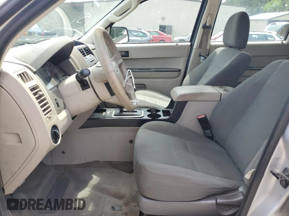 2010 Ford Escape XLS with VIN 1FMCU0C70AKB52226, listed as a Copart auction lot 58241455 with 237,785 mi miles and Salvage title. Bid and sale history available at DreamBid. Image 7.