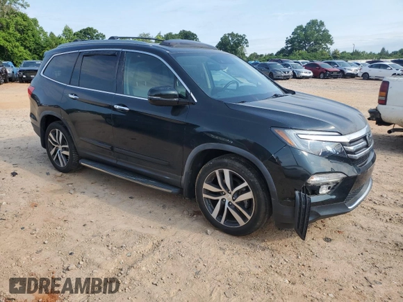 2018 Honda Pilot Elite with VIN 5FNYF6H03JB019900, listed as a Copart auction lot 57497235 with 60,358 mi miles and Salvage title. Bid and sale history available at DreamBid. Image 4.