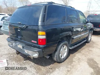 2005 GMC Yukon SLT with VIN 1GKEK13TX5R274020, listed as a IAAI auction lot 41889445 with 209,132 mi miles. Bid and sale history available at carsss.com. Image 4.