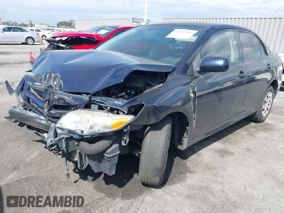 2013 Toyota Corolla L with VIN 5YFBU4EE0DP106114, listed as a IAAI auction lot 42039913 with 184,518 mi miles and . Bid and sale history available at DreamBid. Image 2.