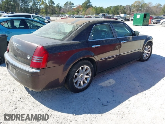 2005 Chrysler 300 with VIN 2C3AA63H75H577363, listed as a IAAI auction lot 41892999 with 229,634 mi miles. Bid and sale history available at carsss.com. Image 4.
