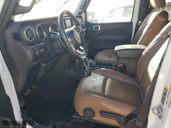 2021 Jeep Wrangler 4xe Unlimited Sahara with VIN 1C4JJXP62MW677073, listed as a Copart auction lot 77494174 with 0 mi miles and Salvage Title. Bid and sale history available at carsss.com. Image 7.