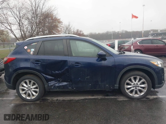 2014 Mazda CX-5 Grand Touring with VIN JM3KE4DY8E0366644, listed as a IAAI auction lot 41971438 with 135,644 mi miles and . Bid and sale history available at carsss.com. Image 13.