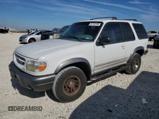 1999 Ford Explorer z VIN 1FMYU22E0XUC69142, wystawiony jako Copart lot #87732735 z przebiegiem 176 581 mil mil oraz Szkoda całkowita • Salvage title. Historia ofert i sprzedaży dostępna na DreamBid. Obrazek 1.