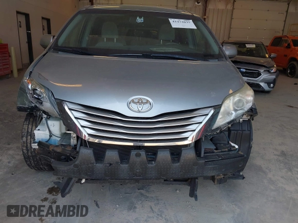 2015 Toyota Sienna LE AAS with VIN 5TDKK3DC2FS643769, listed as a IAAI auction lot 42473037 with 195,211 mi miles and . Bid and sale history available at DreamBid. Image 6.