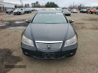 2006 Acura RL with VIN JH4KB16576C003138, listed as a Copart auction lot 52933995 with 176,906 mi miles and Salvage Title. Bid and sale history available at DreamBid. Image 5.