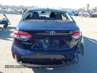2021 Toyota Corolla Hybrid LE with VIN JTDEAMDEXMJ018828, listed as a IAAI auction lot 41633192 with 63,302 mi miles. Bid and sale history available at carsss.com. Image 17.