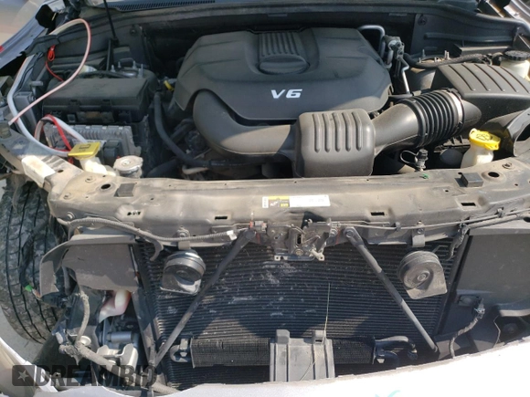 2014 Dodge Durango SXT z VIN 1C4RDJAG8EC455892, wystawiony jako Copart lot #57796095 z przebiegiem 98 251 mil mil oraz Szkoda całkowita • Salvage title. Historia ofert i sprzedaży dostępna na DreamBid. Obrazek 11.