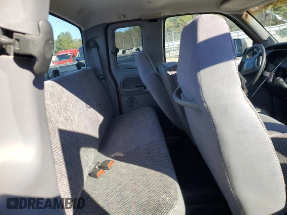 2001 Dodge 2500 z VIN 1B7KC236X1J603433, wystawiony jako Copart lot #86824874 z przebiegiem 204 906 mil mil oraz Szkoda całkowita • Salvage title. Historia ofert i sprzedaży dostępna na DreamBid. Obrazek 10.