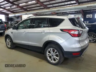 2018 Ford Escape SE z VIN 1FMCU9GD9JUA77812, wystawiony jako Copart lot #57847175 z przebiegiem 106 898 mil mil oraz Czysty tytuł • Clean title. Historia ofert i sprzedaży dostępna na DreamBid. Obrazek 2.
