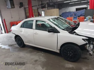 2009 Toyota Corolla z VIN 2T1BU40E89C129686, wystawiony jako IAAI lot #42251775 z przebiegiem 185 332 mil mil oraz . Historia ofert i sprzedaży dostępna na DreamBid. Obrazek 13.