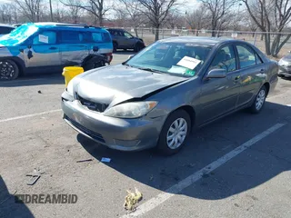 2006 Toyota Camry STD with VIN 4T1BE32K16U652083, listed as a IAAI auction lot 41684992 with 143,657 mi miles and . Bid and sale history available at DreamBid. Image 2.