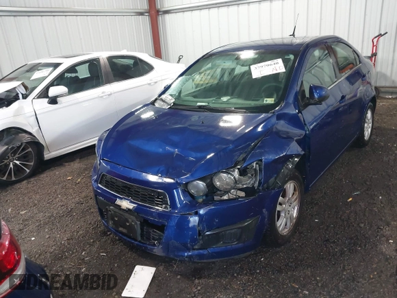 2014 Chevrolet Sonic LT with VIN 1G1JC5SG4E4136790, listed as a IAAI auction lot 37970640 with 180,252 mi miles and . Bid and sale history available at DreamBid. Image 2.