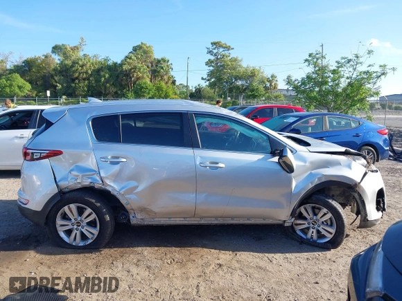 2019 Kia Sportage LX with VIN KNDPM3AC8K7591055, listed as a IAAI auction lot 41962190 with 74,003 mi miles. Bid and sale history available at carsss.com. Image 13.