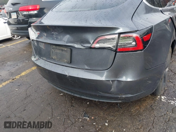 2019 Tesla Model 3 Mid Range with VIN 5YJ3E1EA3KF426971, listed as a IAAI auction lot 41564939 with Not Provided miles and . Bid and sale history available at carsss.com. Image 19.