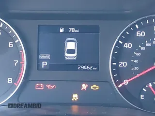 2021 Kia Forte LXS z VIN 3KPF24AD8ME355556, wystawiony jako IAAI lot #42555807 z przebiegiem 29 462 mil mil oraz . Historia ofert i sprzedaży dostępna na DreamBid. Obrazek 7.