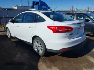 2017 Ford Focus SE with VIN 1FADP3F20HL347495, listed as a IAAI auction lot 41456890 with 94,679 mi miles. Bid and sale history available at carsss.com. Image 3.