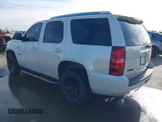 2012 Chevrolet Tahoe Commercial with VIN 1GNLC2E0XCR185593, listed as a IAAI auction lot 41217784 with 150,419 mi miles and . Bid and sale history available at DreamBid. Image 3.