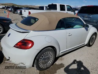 2014 Volkswagen Beetle 1.8T with VIN 3VW517AT4EM818949, listed as a Copart auction lot 49615915 with 103,682 mi miles and Salvage title. Bid and sale history available at DreamBid. Image 3.