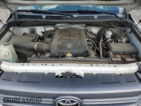 2014 Toyota Tundra SR5 z VIN 5TFDY5F10EX357491, wystawiony jako Copart lot #51216355 z przebiegiem 298 528 mil mil oraz Szkoda całkowita • Salvage title. Historia ofert i sprzedaży dostępna na DreamBid. Obrazek 11.