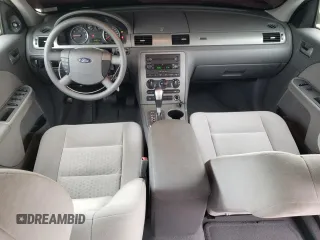 2005 Ford Five Hundred SE z VIN 1FAFP231X5G165841, wystawiony jako Copart lot #43117535 z przebiegiem 154 874 mil mil oraz Czysty tytuł • Clean title. Historia ofert i sprzedaży dostępna na DreamBid. Obrazek 8.