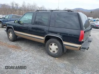 1999 GMC Yukon with VIN 1GKEK13R9XJ807786, listed as a IAAI auction lot 41478109 with 193,748 mi miles. Bid and sale history available at carsss.com. Image 3.