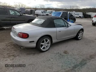 2001 Mazda MX-5 Miata with VIN JM1NB353510214097, listed as a Copart auction lot 50306595 with 111,359 mi miles and Salvage Title. Bid and sale history available at DreamBid. Image 3.
