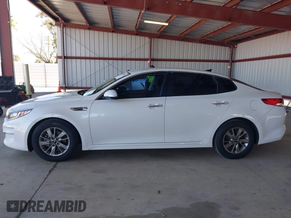 2016 Kia Optima LX Turbo with VIN 5XXGT4L19GG043570, listed as a IAAI auction lot 41837500 with 160,231 mi miles. Bid and sale history available at carsss.com. Image 14.