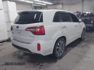2015 Kia Sorento SX Limited with VIN 5XYKWDA70FG619582, listed as a IAAI auction lot 41558289 with 115,222 mi miles. Bid and sale history available at carsss.com. Image 4.