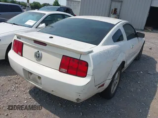 2007 Ford Mustang Deluxe with VIN 1ZVFT80N775312340, listed as a IAAI auction lot 42391348 with Not provided miles and . Bid and sale history available at DreamBid. Image 4.