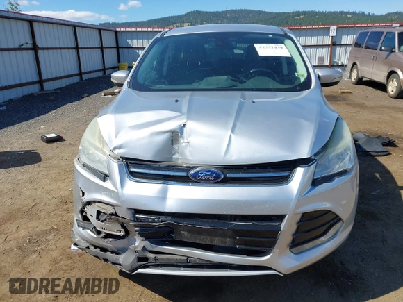 2013 Ford Escape SEL with VIN 1FMCU0H96DUA30733, listed as a IAAI auction lot 42737439 with 106,651 mi miles and . Bid and sale history available at DreamBid. Image 12.