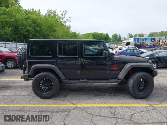 2014 Jeep Wrangler Unlimited Sahara с VIN 1C4BJWEG0EL248401, выставлен на аукционе IAAI как лот 42306970 с пробегом 134 904 миль миль и . История ставок и продаж доступна на DreamBid. Изображение 13.