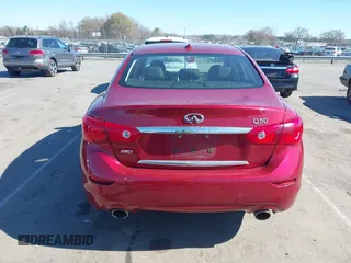2015 Infiniti Q50 z VIN JN1BV7AR6FM420284, wystawiony jako IAAI lot #41795605 z przebiegiem 160 353 mil mil oraz . Historia ofert i sprzedaży dostępna na DreamBid. Obrazek 16.