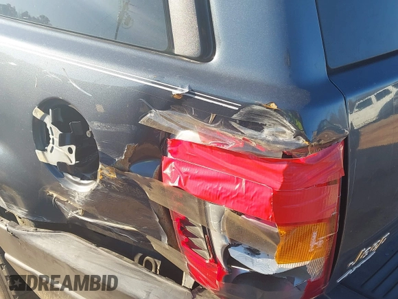 2004 Jeep Grand Cherokee Laredo z VIN 1J4GW48S24C159370, wystawiony jako IAAI lot #41296094 z przebiegiem 138 296 mil mil oraz . Historia ofert i sprzedaży dostępna na DreamBid. Obrazek 15.