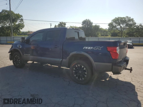 2017 Nissan Titan Pro-4X with VIN 1N6AA1E5XHN544948, listed as a Copart auction lot 61851175 with 216,797 mi miles and Clean title. Bid and sale history available at DreamBid. Image 2.