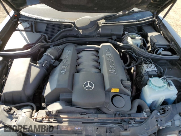2002 Mercedes-Benz E-Class with VIN WDBJF70J22B489706, listed as a Copart auction lot 71109874 with 59,167 mi miles and Salvage Title. Bid and sale history available at carsss.com. Image 12.