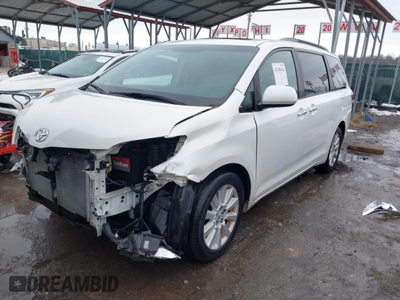 2015 Toyota Sienna Ltd with VIN 5TDDK3DC9FS115784, listed as a IAAI auction lot 41355934 with 125,675 mi miles. Bid and sale history available at carsss.com. Image 2.